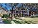 Building exterior showcasing landscaping and lawn at 702 Rum Run # 38702, Davenport, FL 33897