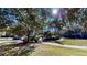 Community pool area with walkway and lush landscaping at 702 Rum Run # 38702, Davenport, FL 33897