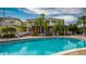 Resort-style pool with a clubhouse in the background at 702 Rum Run # 38702, Davenport, FL 33897
