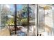 Relaxing screened porch overlooking lush landscaping at 702 Rum Run # 38702, Davenport, FL 33897