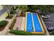 Two shuffleboard courts with scoring areas and surrounding fence at 702 Rum Run # 38702, Davenport, FL 33897