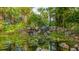 Serene water feature with waterfall and lily pads at 702 Rum Run # 38702, Davenport, FL 33897