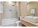 Bathroom with shower/tub combo, toilet, and vanity at 7575 Brooklyn Dr, Kissimmee, FL 34747