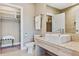 Modern bathroom with walk-in shower, vanity, and toilet at 7575 Brooklyn Dr, Kissimmee, FL 34747