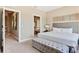 King bedroom with an ensuite bathroom and walk-in closet at 7575 Brooklyn Dr, Kissimmee, FL 34747