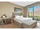 King bedroom with a city view and private access to the backyard at 7575 Brooklyn Dr, Kissimmee, FL 34747