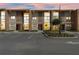 Contemporary townhome at dusk with parking at 7575 Brooklyn Dr, Kissimmee, FL 34747