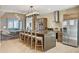 Modern kitchen with large island and stainless steel appliances at 7575 Brooklyn Dr, Kissimmee, FL 34747