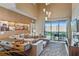 Open living space with sectional sofa and backyard view at 7575 Brooklyn Dr, Kissimmee, FL 34747