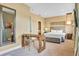 Spacious main bedroom with a king-size bed and an ensuite bathroom at 7575 Brooklyn Dr, Kissimmee, FL 34747