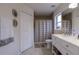 Bathroom boasts a double vanity and updated fixtures at 7749 Brookway St, Orlando, FL 32817