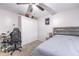 Well-lit bedroom with a full-size bed and ample closet space at 7749 Brookway St, Orlando, FL 32817