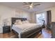 Large bedroom with king-size bed and plenty of natural light at 7749 Brookway St, Orlando, FL 32817