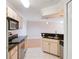 Kitchen with granite countertops and stainless steel appliances at 814 Crest Pines Dr # 937, Orlando, FL 32828