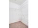 Large walk-in closet with wire shelving at 814 Crest Pines Dr # 937, Orlando, FL 32828