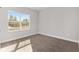 Spacious bedroom with carpeted floor and window at 8549 Sw 129Th Ln, Ocala, FL 34473