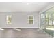 Bright living room with hardwood floors and sliding glass doors at 8549 Sw 129Th Ln, Ocala, FL 34473