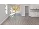 Open concept living area with view of kitchen and patio at 8549 Sw 129Th Ln, Ocala, FL 34473
