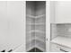 Spacious corner pantry with wire shelving; offers ample storage at 8549 Sw 129Th Ln, Ocala, FL 34473