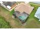 Aerial view of house with pool and screened enclosure at 11537 Blackmoor Dr, Orlando, FL 32837