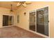 Covered patio with brick flooring, sliding doors, and ceiling fans at 11537 Blackmoor Dr, Orlando, FL 32837