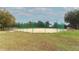 Community baseball field with fenced enclosure and seating at 11537 Blackmoor Dr, Orlando, FL 32837