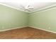 Empty bedroom with wood-look tile floor and ceiling fan at 11537 Blackmoor Dr, Orlando, FL 32837