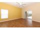 Gathering room with wood-look tile floors and sliding doors to patio at 11537 Blackmoor Dr, Orlando, FL 32837