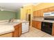 Kitchen features a breakfast bar and ample counter space at 11537 Blackmoor Dr, Orlando, FL 32837