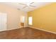 Main bedroom with wood-look floors and access to bathroom at 11537 Blackmoor Dr, Orlando, FL 32837