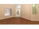 Spacious office with wood-look tile floors and large window at 11537 Blackmoor Dr, Orlando, FL 32837