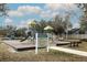 Playground with play structures and rules sign at 11537 Blackmoor Dr, Orlando, FL 32837