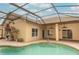 Screened pool and patio area with brick pavers at 11537 Blackmoor Dr, Orlando, FL 32837