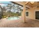 Screened pool and patio area with brick pavers at 11537 Blackmoor Dr, Orlando, FL 32837