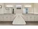 Elegant bathroom with double vanity, soaking tub, and separate shower at 11769 Hampstead St, Windermere, FL 34786