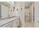 ' bathroom with single vanity and shower at 11769 Hampstead St, Windermere, FL 34786