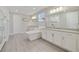 Luxurious bathroom with double vanity and free-standing tub at 11769 Hampstead St, Windermere, FL 34786