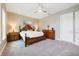 Bright bedroom featuring a comfortable bed and ample closet space at 11769 Hampstead St, Windermere, FL 34786