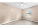 Light pink bedroom with wood flooring and window at 1220 Alden Ter, Deltona, FL 32738