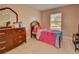 bedroom with hardwood floors and Hello Kitty bedding at 1220 Alden Ter, Deltona, FL 32738