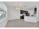 Bright dining room with chandelier and access to kitchen at 144 Trinity Ridge Cir, Davenport, FL 33897