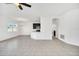 Kitchen with island and dark brown cabinetry at 144 Trinity Ridge Cir, Davenport, FL 33897