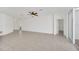 Bright and airy living room with tile floors at 144 Trinity Ridge Cir, Davenport, FL 33897