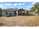 Backyard with screened porch and playset at 15208 Stonebriar Way, Orlando, FL 32826