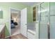 Bathroom with garden tub and access to bedroom at 15208 Stonebriar Way, Orlando, FL 32826