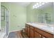 Bathroom with double sinks, shower, and toilet at 15208 Stonebriar Way, Orlando, FL 32826