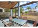 Spacious screened porch with seating area at 15208 Stonebriar Way, Orlando, FL 32826