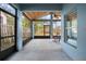 Screened porch with table and chairs at 15208 Stonebriar Way, Orlando, FL 32826