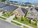 Aerial view of a house with solar panels, showcasing the property and surrounding neighborhood at 1593 Osprey View Dr, Apopka, FL 32703