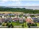 Aerial view showcasing a house's location in a neighborhood by the water at 1873 Donahue Dr, Ocoee, FL 34761